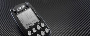 AiM Sportline MultiChron | Chronomètre numérique portable pour 4 pilotes